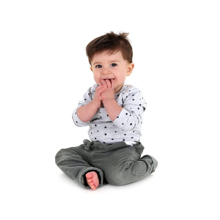 Smiling child during a naming ceremony led by Molly’s Ceremonies