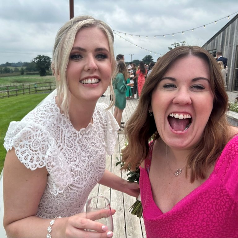 Owner and founder Molly with a happy bride, celebrating their special day after the wedding in Chester.